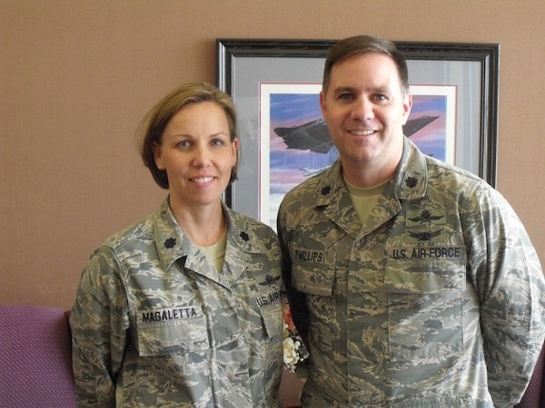 Lt. Col. Sue Magaletta, USAF, chapter vice president, discusses future chapter strategies with Col. Michael Phillips, USAF, chapter president, during the April luncheon held on Beale Air Force Base.